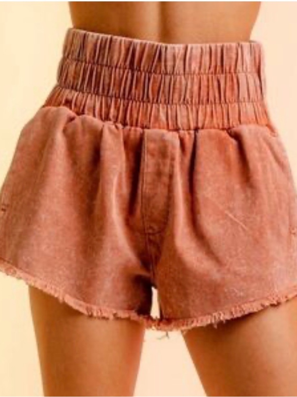 New In high waist 100% marled orange shorts. Juniors large. New without tag